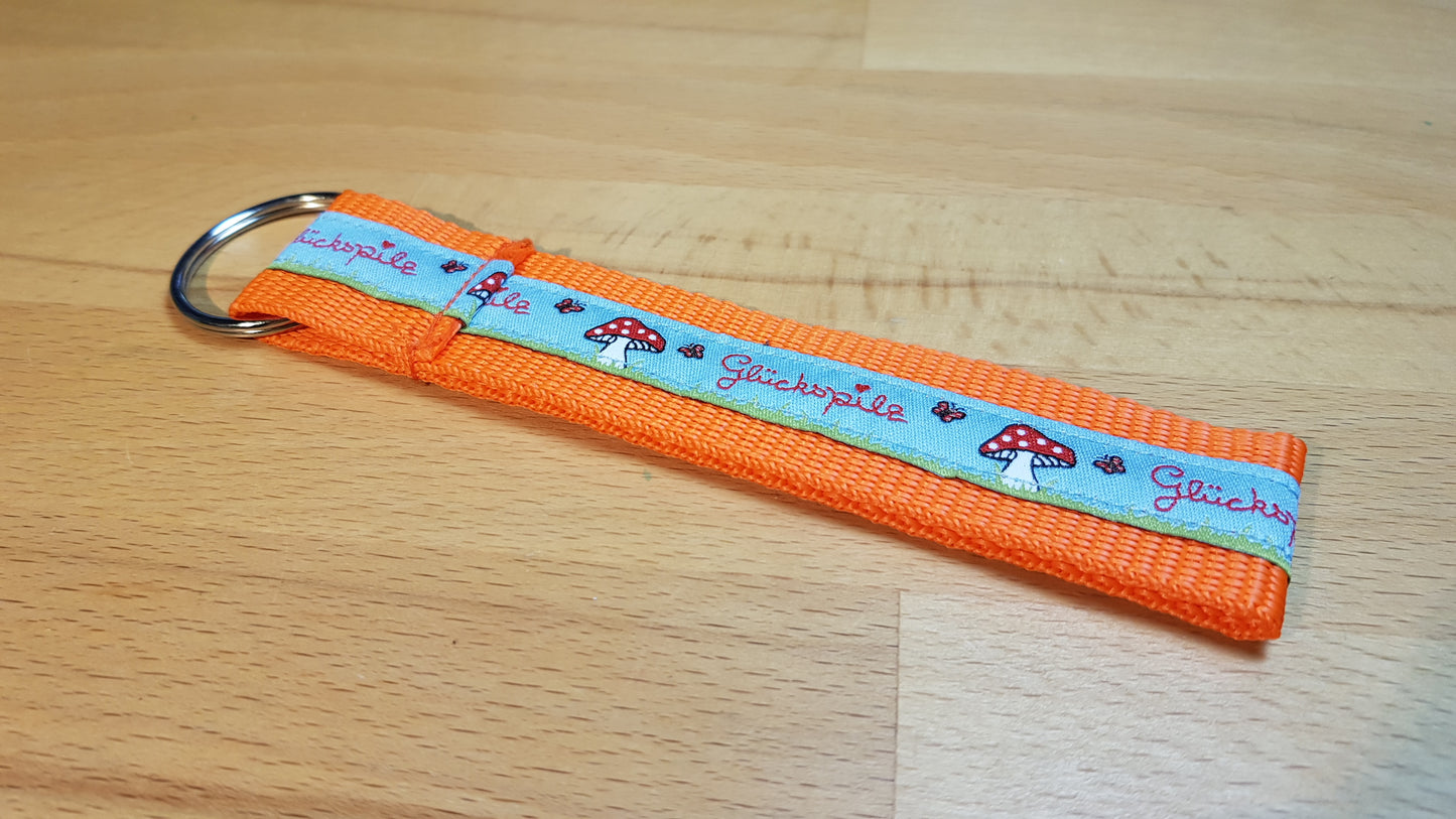Schlüsselband Gurtband orange + Glückspilzband