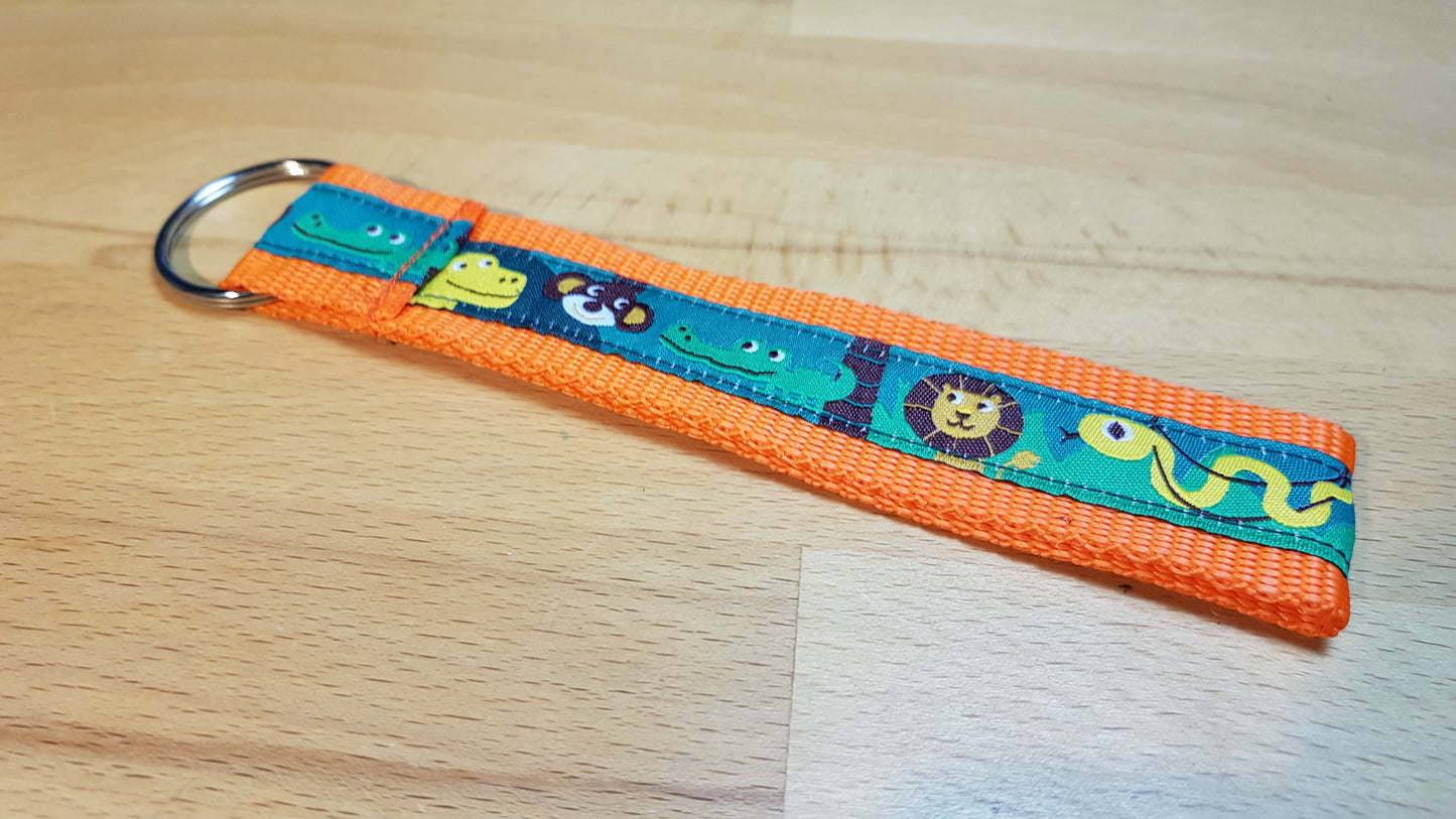 Schlüsselband Gurtband orange mit einem Dschungelband
