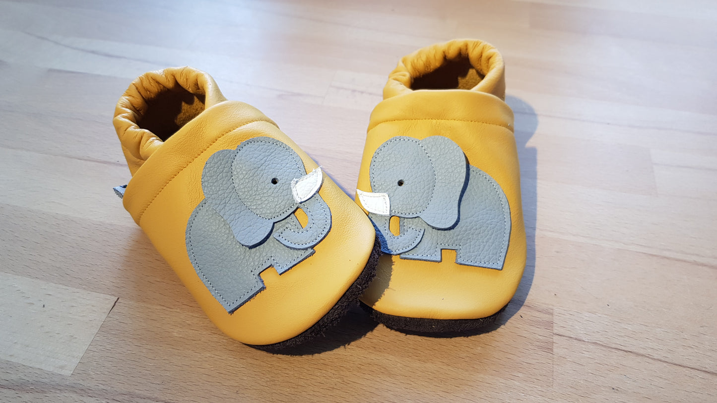 Lederpuschen mit Elefanten