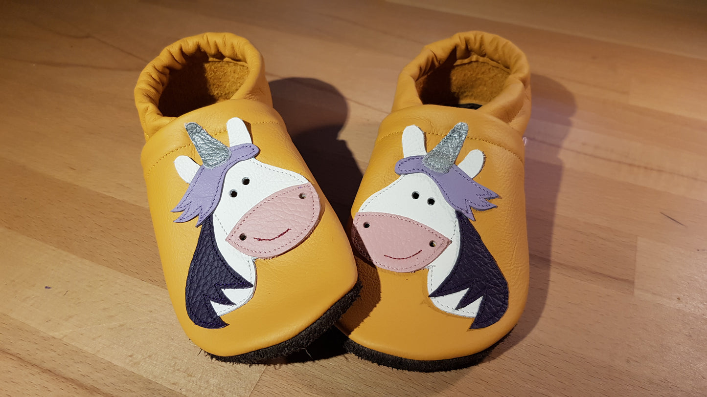 Lederpuschen Einhorn gelb