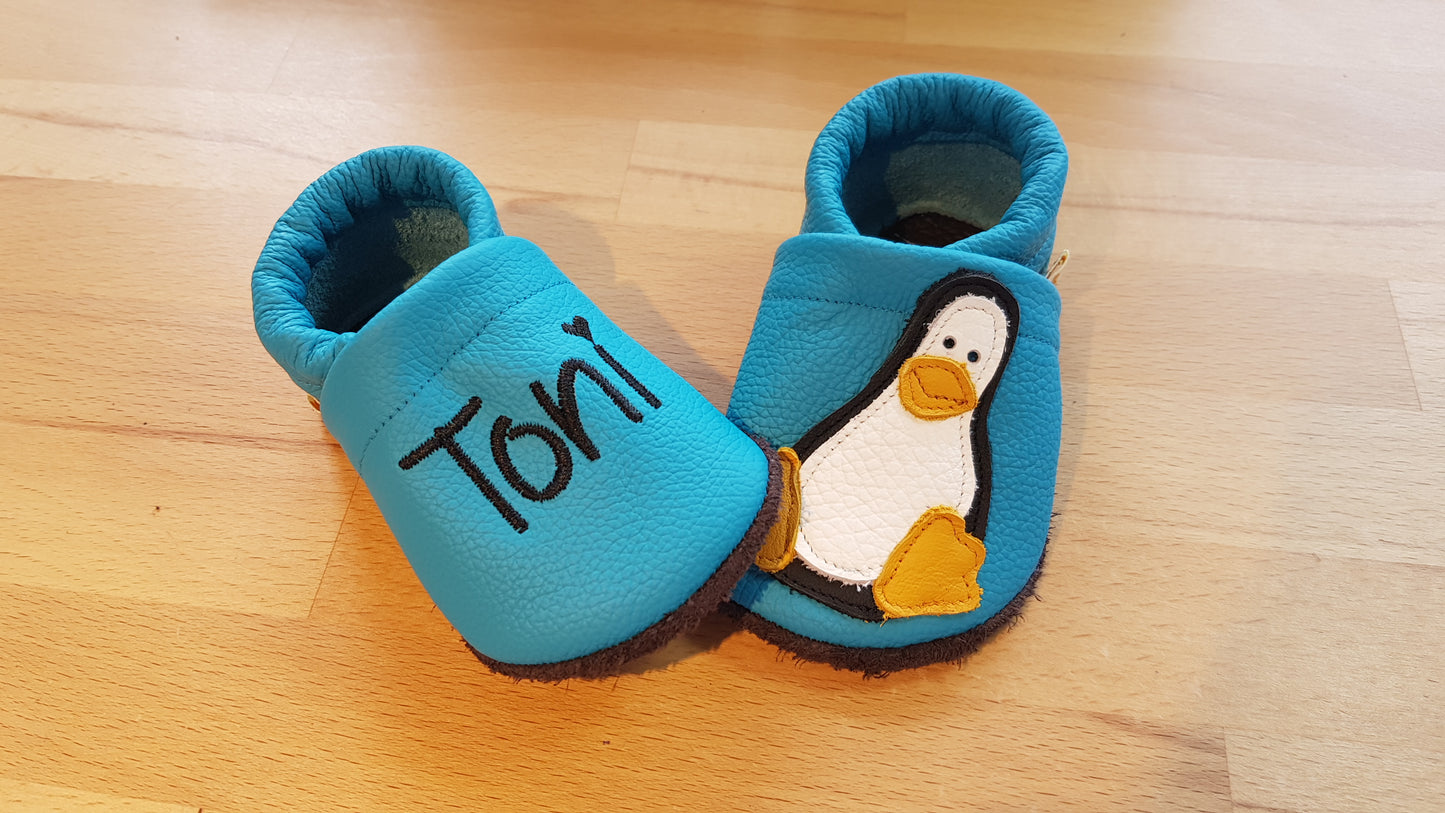 Lederpuschen Pinguin Name türkis