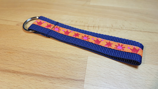 Schlüsselband Gurtband dunkelblau mit orangfarbenem Krone-Blume-Sternband