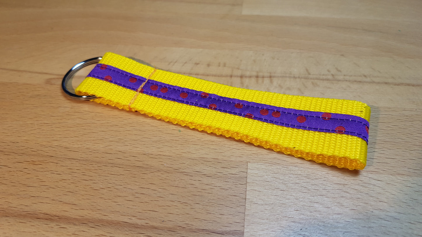 Schlüsselband Gurtband gelb mit lia-rotem Pünktchenband